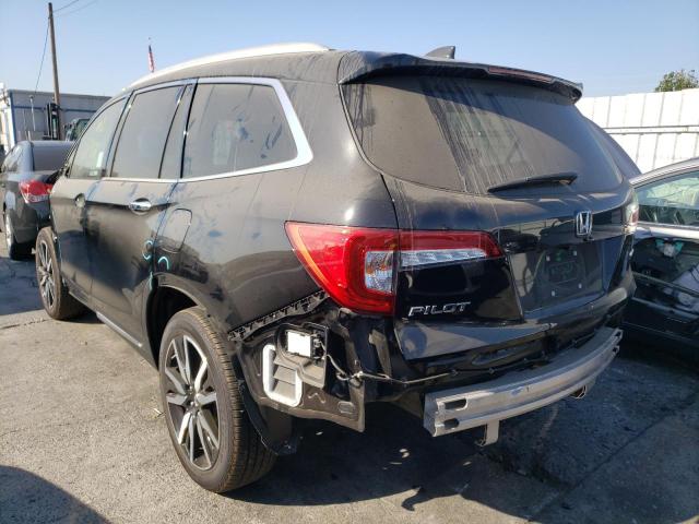 Photo 3 from auction – 2021 HONDA PILOT TOUR with VIN 5FNYF5H95MB020172