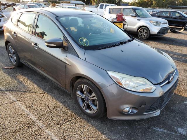 FORD FOCUS SE 2014 with VIN 1FADP3K20EL210218 - Photo from auction