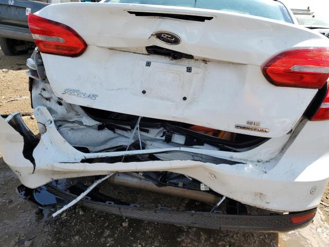 Photo 9 from auction – 2016 FORD FOCUS SE with VIN 1FADP3F28GL311035