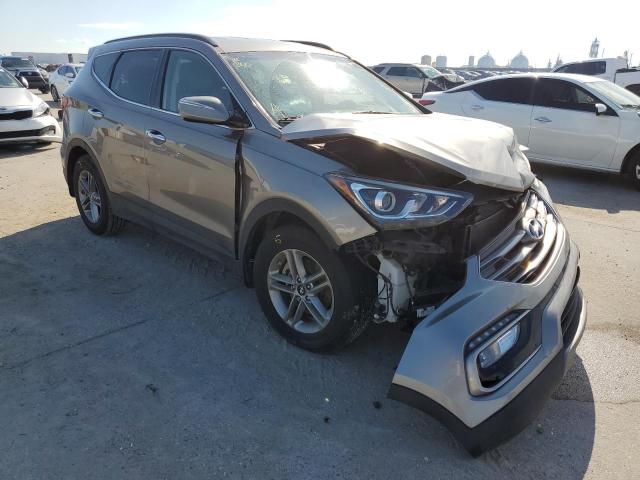 HYUNDAI SANTA FE S 2018 with VIN 5NMZU3LB7JH077265 - Photo from auction
