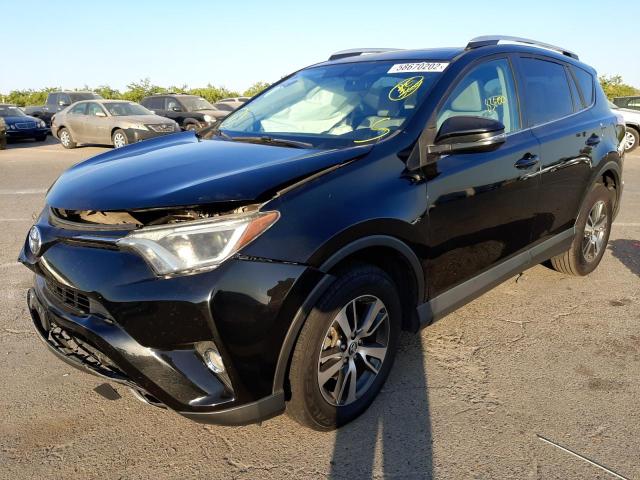 Photo 2 from auction – 2016 TOYOTA RAV4 XLE with VIN 2T3WFREV9GW279133