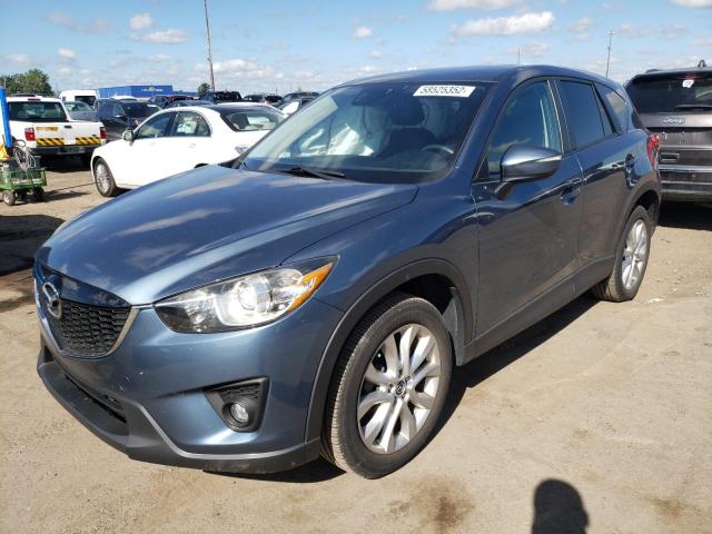 Photo 2 from auction – 2015 MAZDA CX-5 GT with VIN JM3KE4DYXF0498323