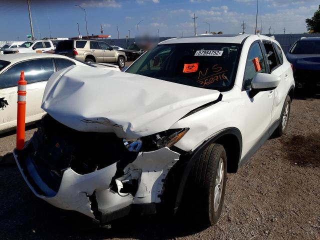 Photo 2 from auction – 2014 MAZDA CX-5 TOURI with VIN JM3KE4CY8E0360716