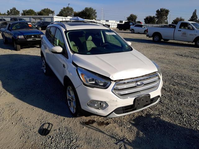 FORD ESCAPE TIT 2018 with VIN 1FMCU9J9XJUA04694 - Photo from auction