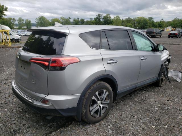 Photo 4 from auction – 2018 TOYOTA RAV4 LE with VIN 2T3BFREV9JW843577