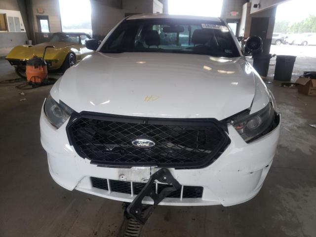 Photo 9 from auction – 2014 FORD TAURUS POL with VIN 1FAHP2MK2EG164909