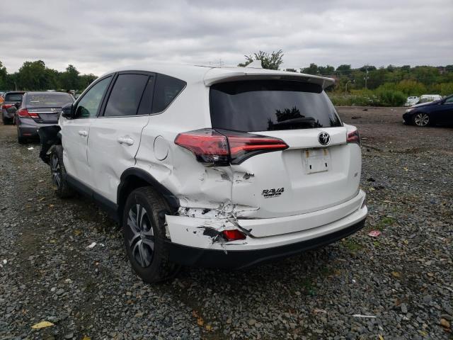 Photo 3 from auction – 2018 TOYOTA RAV4 LE with VIN 2T3ZFREV5JW512557