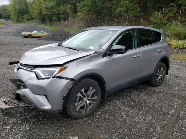 Photo 2 from auction – 2018 TOYOTA RAV4 LE with VIN 2T3BFREV9JW843577