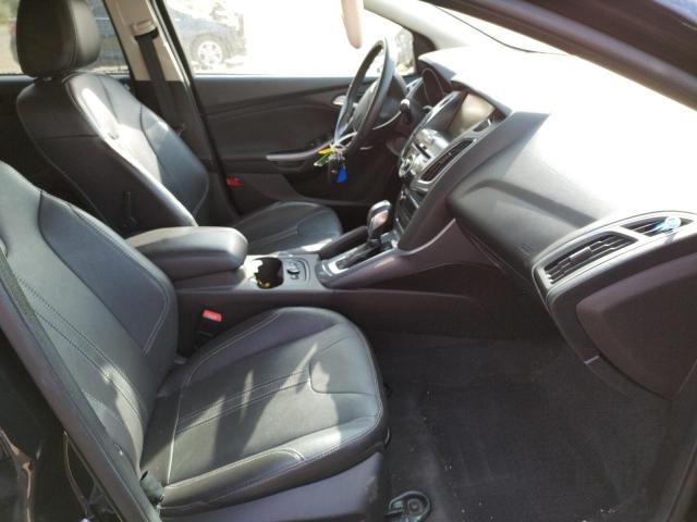 Photo 5 from auction – 2014 FORD FOCUS TITA with VIN 1FADP3J27EL195024