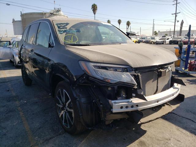 Photo 1 from auction – 2021 HONDA PILOT TOUR with VIN 5FNYF5H95MB020172