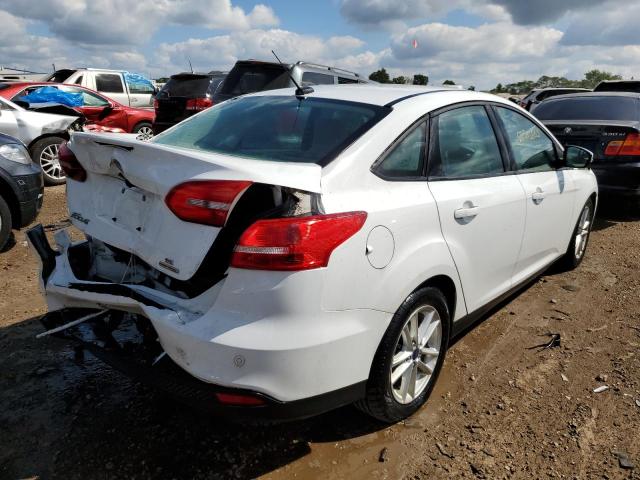 Photo 4 from auction – 2016 FORD FOCUS SE with VIN 1FADP3F28GL311035