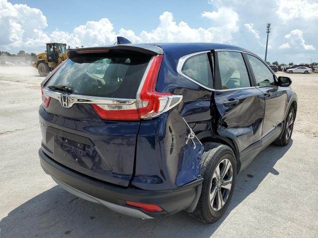 Photo 4 from auction – 2017 HONDA CR-V LX with VIN 7FARW5H37HE011788