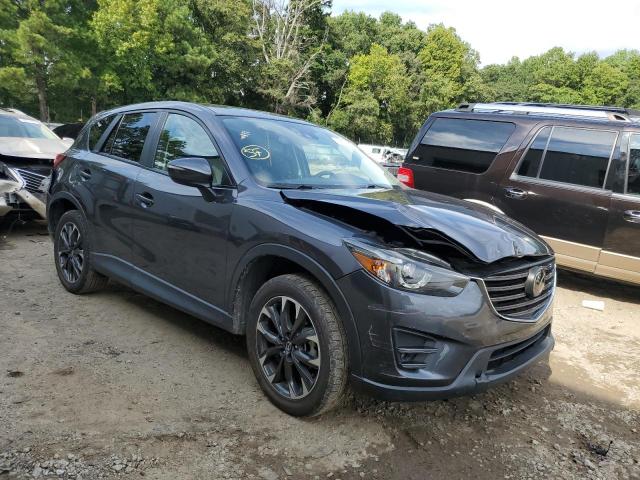 MAZDA CX-5 GT 2016 with VIN JM3KE2DY0G0796692 - Photo from auction