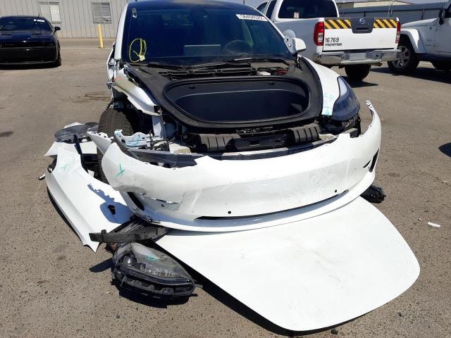 Photo 9 from auction – 2022 TESLA MODEL 3 with VIN 5YJ3E1EB7NF174963