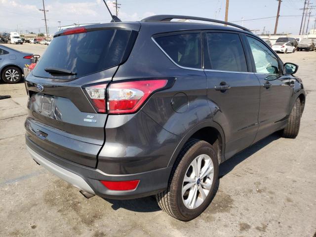 Photo 4 from auction – 2018 FORD ESCAPE SE with VIN 1FMCU9GD8JUA67207