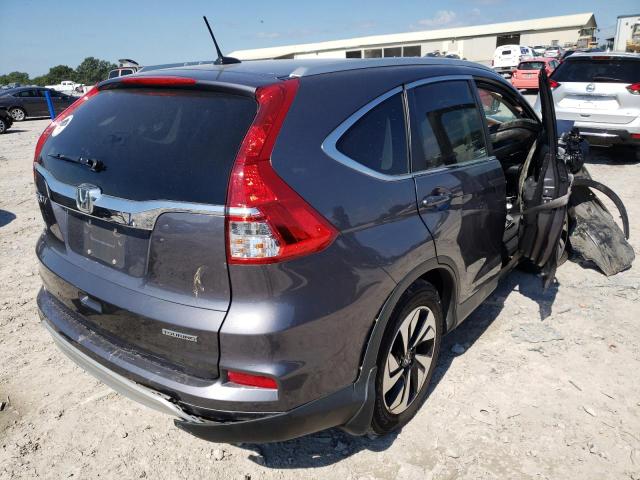 Photo 4 from auction – 2016 HONDA CR-V TOURI with VIN 5J6RM3H98GL013422