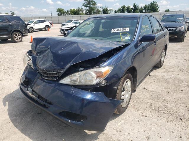 Photo 2 from auction – 2002 TOYOTA CAMRY LE with VIN JTDBE30K720021962