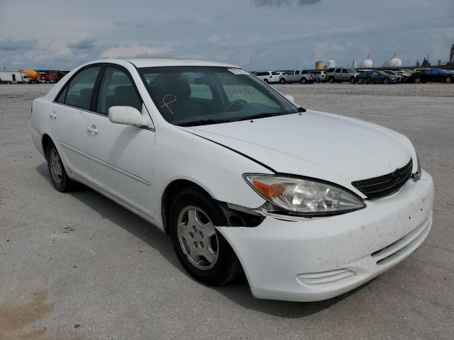 TOYOTA CAMRY LE 2003 with VIN 4T1BF32K73U053696 - Photo from auction