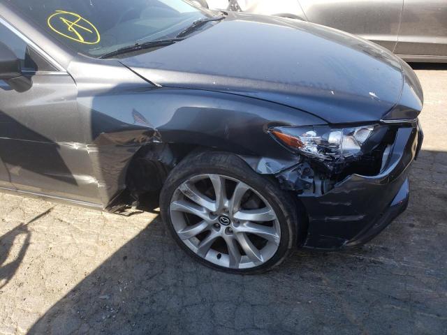 Photo 9 from auction – 2014 MAZDA 6 TOURING with VIN JM1GJ1V64E1125020