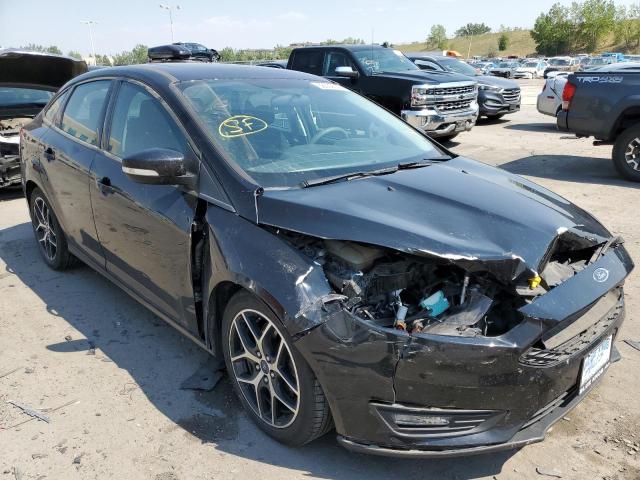 FORD FOCUS SEL 2018 with VIN 1FADP3H20JL234861 - Photo from auction