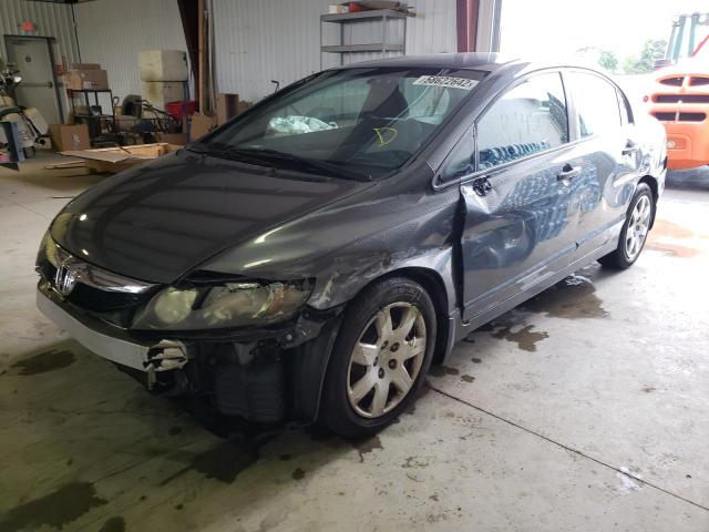 Photo 2 from auction – 2011 HONDA CIVIC LX with VIN 19XFA1F56BE004533