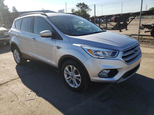 FORD ESCAPE SE 2018 with VIN 1FMCU0GD5JUB75277 - Photo from auction