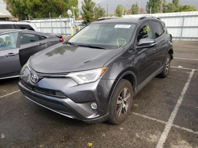 Photo 2 from auction – 2016 TOYOTA RAV4 XLE with VIN JTMRFREV4GJ082057