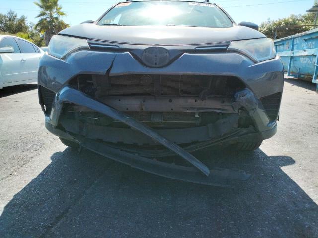 Photo 9 from auction – 2016 TOYOTA RAV4 LE with VIN JTMZFREV9GJ079400