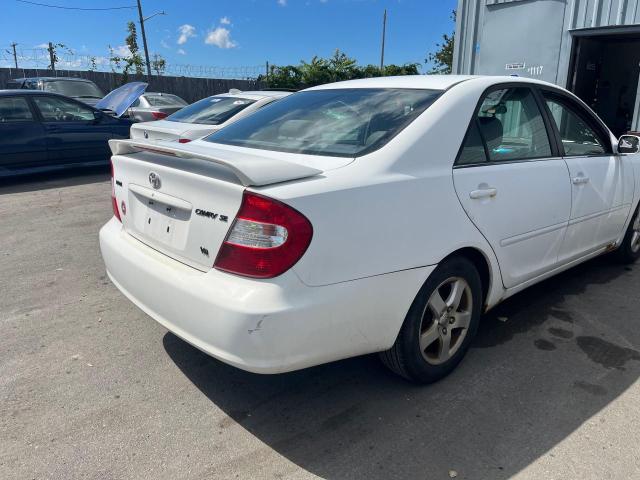 Photo 4 from auction – 2002 TOYOTA CAMRY LE with VIN 4T1BF32K22U019809