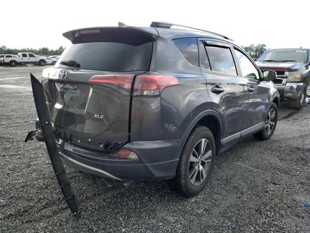 Photo 4 from auction – 2017 TOYOTA RAV4 XLE with VIN JTMWFREV2HJ123581