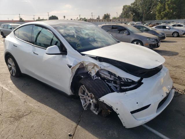 TESLA MODEL Y 2021 with VIN 5YJYGDEE7MF300040 - Photo from auction