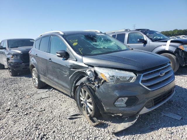 FORD ESCAPE TIT 2017 with VIN 1FMCU0J93HUC28685 - Photo from auction