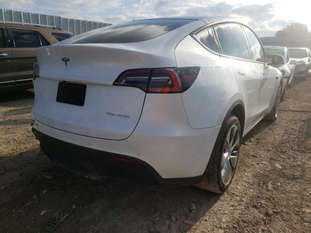 Photo 4 from auction – 2021 TESLA MODEL Y with VIN 5YJYGDEE0MF106188