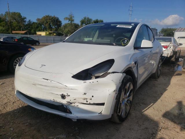 Photo 2 from auction – 2021 TESLA MODEL Y with VIN 5YJYGDEE0MF106188