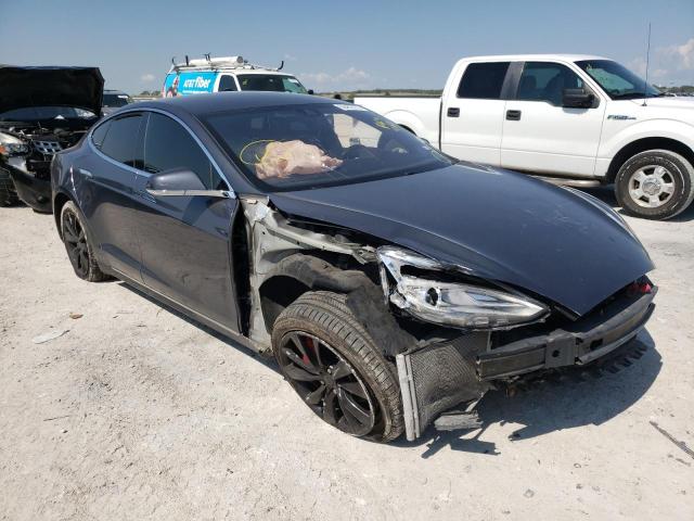 TESLA MODEL S 2014 with VIN 5YJSA1H25EFP63481 - Photo from auction