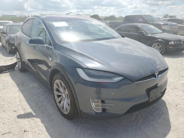 TESLA MODEL X 2017 with VIN 5YJXCAE29HF063827 - Photo from auction