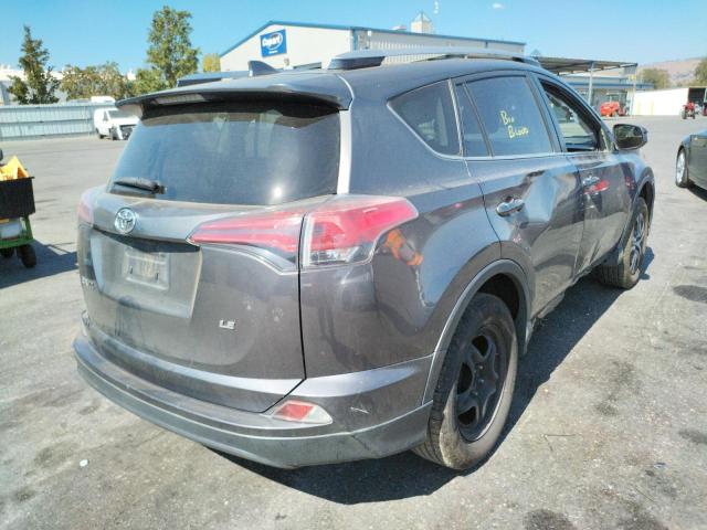 Photo 4 from auction – 2016 TOYOTA RAV4 LE with VIN JTMZFREV9GJ079400