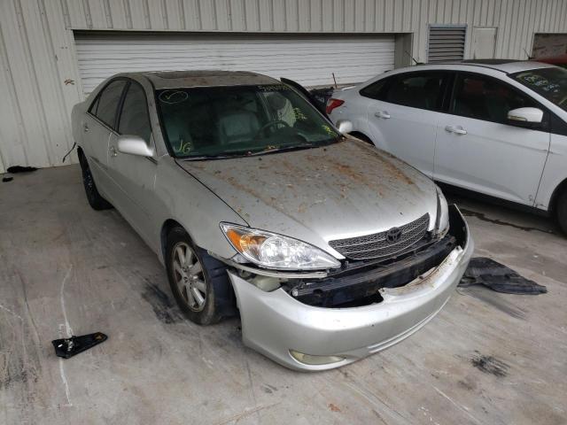 TOYOTA CAMRY LE 2004 with VIN 4T1BF30K04U568625 - Photo from auction