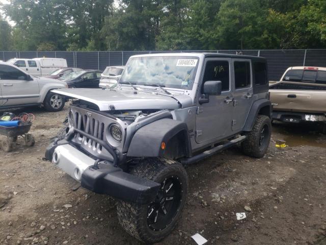 Photo 2 from auction – 2014 JEEP WRANGLER U with VIN 1C4BJWDG4EL120292