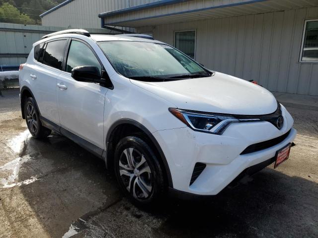 TOYOTA RAV4 LE 2018 with VIN 2T3BFREV2JW744650 - Photo from auction