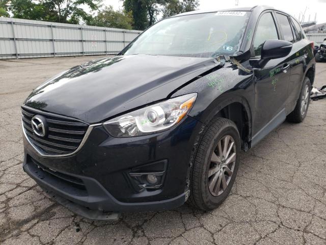 Photo 2 from auction – 2016 MAZDA CX-5 TOURI with VIN JM3KE4CY6G0918940