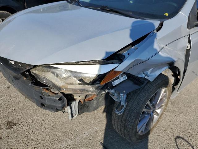 Photo 9 from auction – 2014 TOYOTA COROLLA L with VIN 2T1BURHE9EC129031