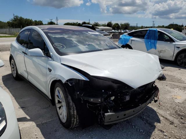 TESLA MODEL X 2018 with VIN 5YJXCDE21JF118990 - Photo from auction