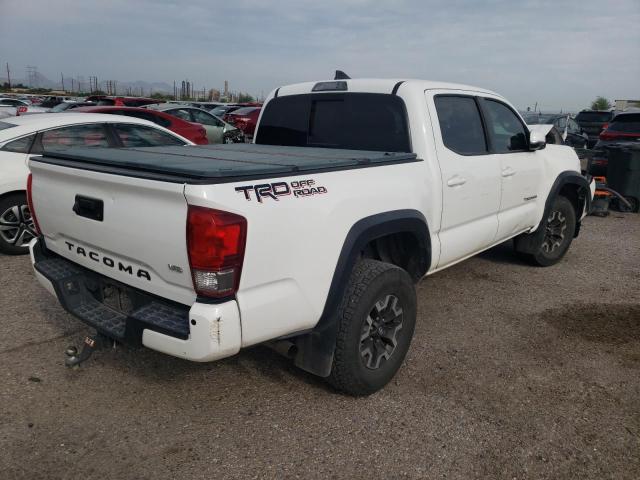 Photo 4 from auction – 2017 TOYOTA TACOMA DOU with VIN 3TMAZ5CN2HM032584