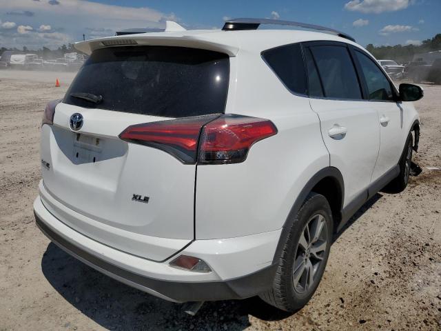 Photo 4 from auction – 2017 TOYOTA RAV4 XLE with VIN 2T3WFREV6HW362391