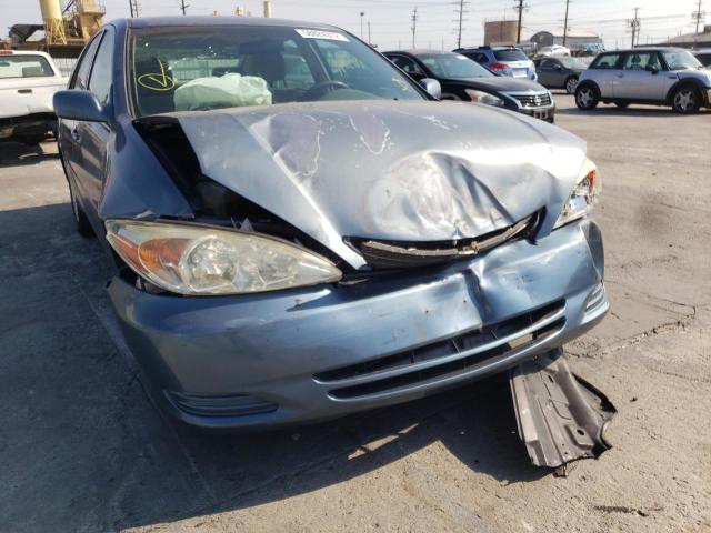 Photo 9 from auction – 2004 TOYOTA CAMRY LE with VIN 4T1BF30K64U580987