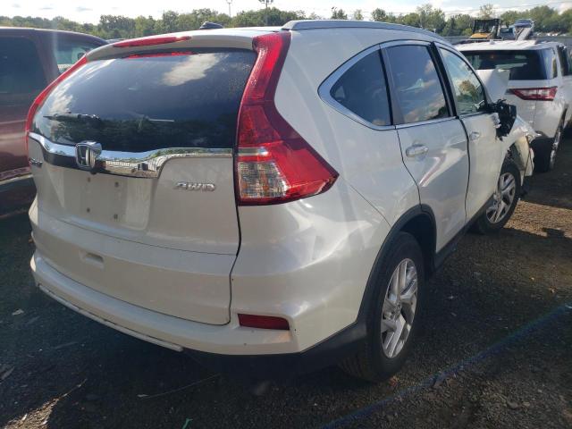 Photo 4 from auction – 2016 HONDA CR-V EXL with VIN 5J6RM4H75GL041246