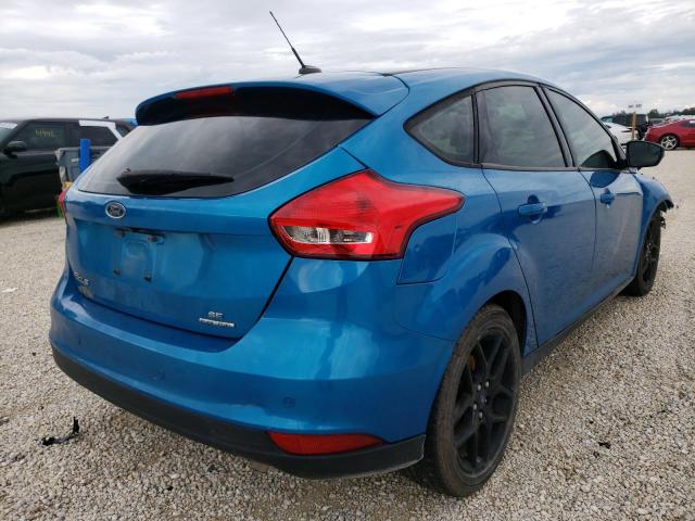 Photo 4 from auction – 2016 FORD FOCUS SE with VIN 1FADP3K29GL402367