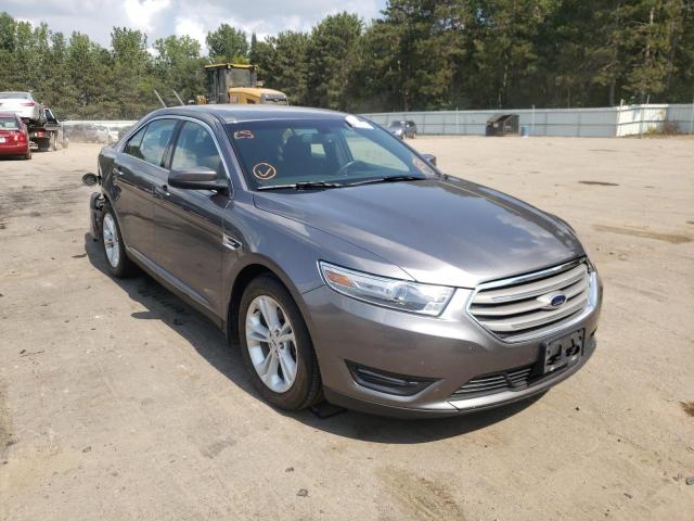FORD TAURUS SEL 2014 with VIN 1FAHP2E88EG137927 - Photo from auction