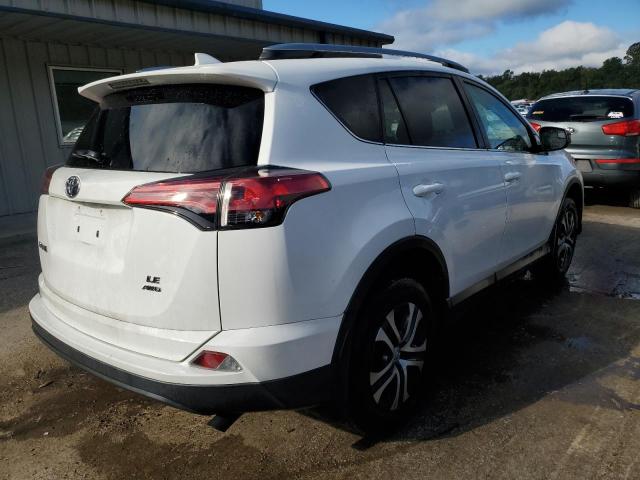 Photo 4 from auction – 2018 TOYOTA RAV4 LE with VIN 2T3BFREV2JW744650
